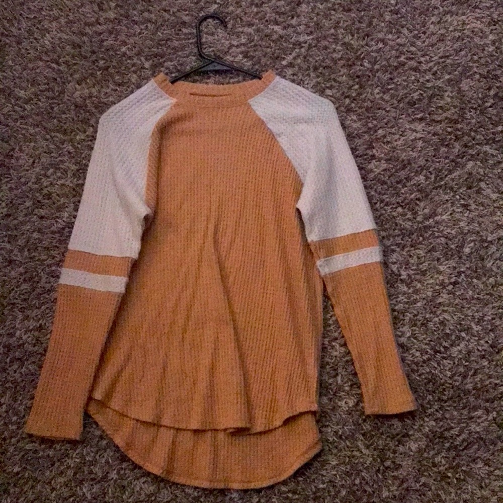 Beige and cream colored top